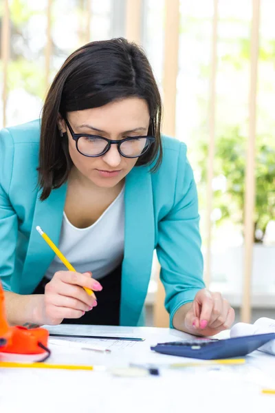 Photo of woman with pencil working with papers. — Stock Photo, Image