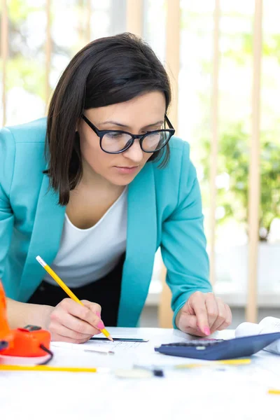 Photo of woman with pencil working with papers. — Stock Photo, Image
