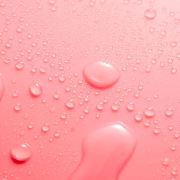 Gotas Agua Pastel Rosa Superficie Brillante Luz — Foto de Stock