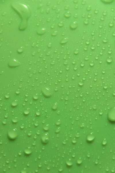 Zöld Pasztell Vízcseppek Világos Fényes Felületen — Stock Fotó