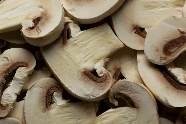 Çiğ taze şampiyon mantarları. Gıda arka planı, organik gıda 