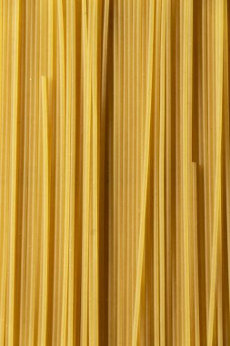 Close up of raw spaghetti pasta, food backgrounds, organic ingredients