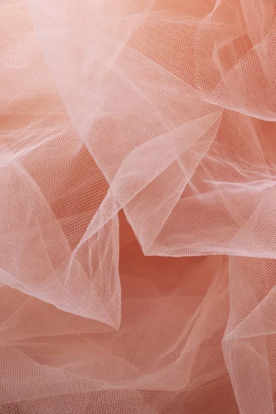 Pembe tül malzeme arka plan, pastel renkler, romantik ve narin kumaşlar.