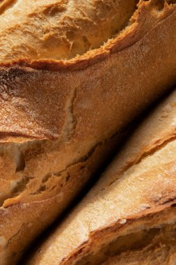 Close up of french crusty baguette, bread bakery themes