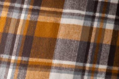 Modaya uygun yünlü kumaş, sıcak modern tekstil yakın görünüm.