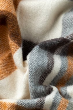 Modaya uygun yünlü kumaş, sıcak modern tekstil yakın görünüm.