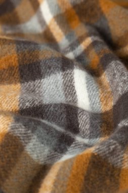 Modaya uygun yünlü kumaş, sıcak modern tekstil yakın görünüm.