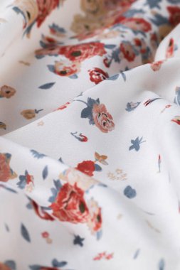 Modaya uygun çiçekli kumaş, modern tekstil yakın görüntüsü.