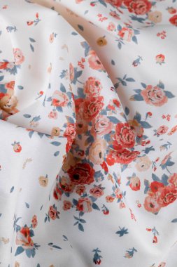 Modaya uygun çiçekli kumaş, modern tekstil yakın görüntüsü.