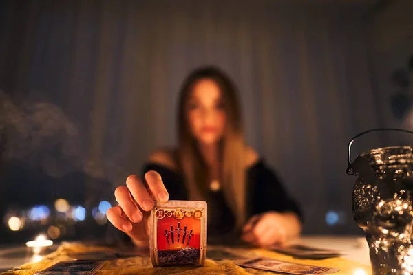 Woman reading tarot cards in spiritual room. — Stock Photo, Image