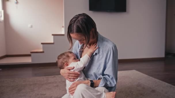 Cute little baby boy lying on mothers hands and sucking breast milk. Concept of healthy and natural baby breastfeeding nutrition — Stock Video © natapetrovich   