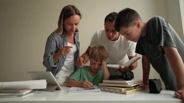 Father Helping His Son Schoolwork Young Little Shoolboy Solving Mathematics — Stock Video