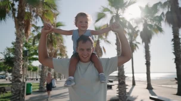 Father Carrying Son Months Shoulders Walking Beach Happy Father Son — Stockvideo