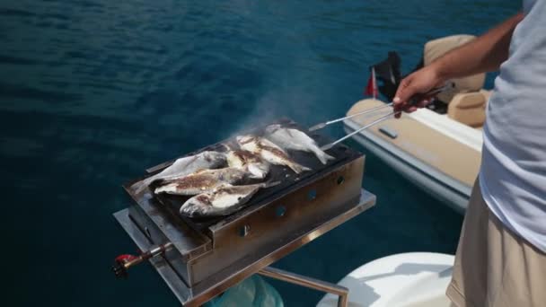 Closeup Preparing Grilled Sea Bass Fish Outdoors Open Sea While — Stockvideo
