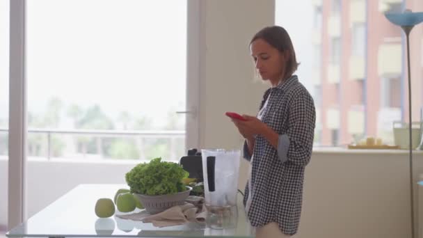 Young Sportswoman Putting Washed Greenery Table Cooking Smoothie Happy Vegetarian — Stock videók