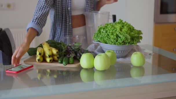 Young Sportswoman Putting Washed Greenery Table Cooking Smoothie Happy Vegetarian — Vídeo de stock