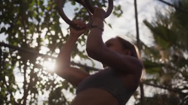 Healthy Woman Training Gymnastics Exercise Using Rings Enjoying Intense Fitness — Stockvideo