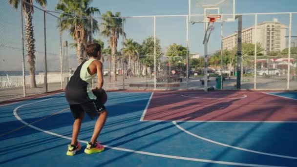 Young Caucasian Boy Basketball Player Dribbling Practicing Ball Handling Skill — Vídeo de stock