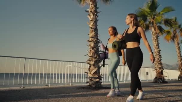 Portrait Two Woman Wearing Sportswear Holding Yoga Mat Preparing Training — Wideo stockowe