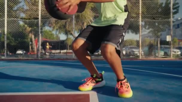 Close Young Spotsman Bouncing Basketball Ball Training Ground Floor Court — Vídeo de Stock