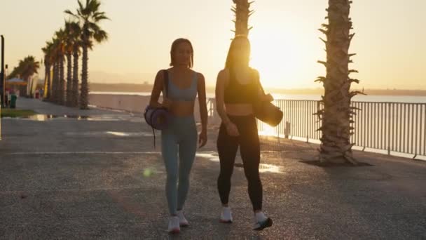 Portrait Two Woman Wearing Sportswear Holding Yoga Mat Preparing Training — стоковое видео