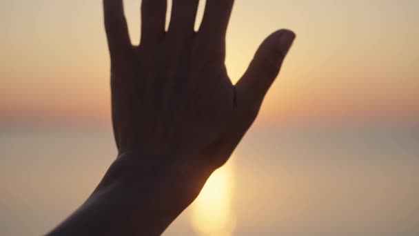 Person Holding Hand Light Touching Rays Warm Sunshine Finger Tips — Stockvideo
