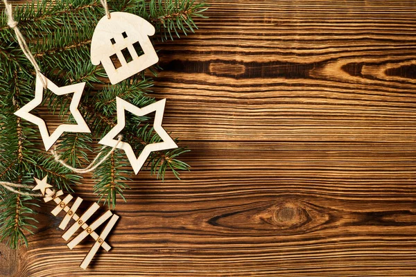 Vánoční Dřevěné Hvězdy Nový Rok Strom Dům Jedlovými Větvemi Dřevěném — Stock fotografie