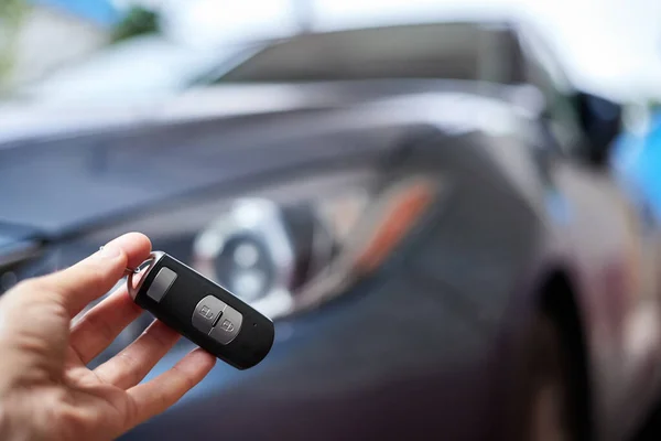 Car Owner Holds His Hand Remote Control Device Keyless Entry — Stock Photo, Image