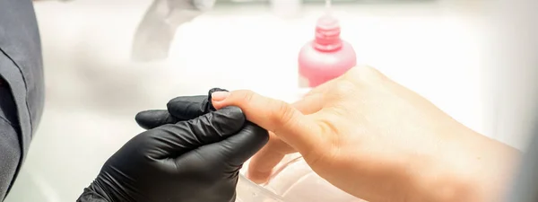 Close Professional Manicure Master Holds Female Hand Customer Disinfects Nails — Fotografia de Stock