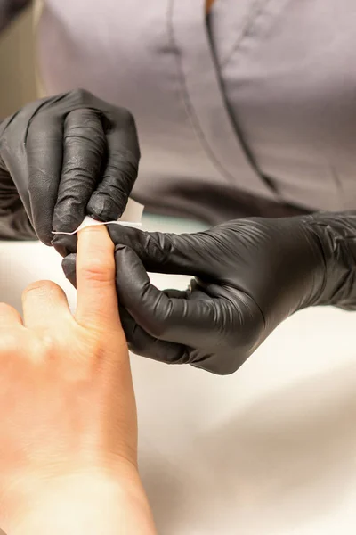 Manicurist Finishes Procedure Red Nail Polishing Cleaning Cotton Napkin Pad — Stock Photo, Image