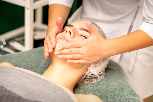 Facial Treatment Massage Beautiful Young Caucasian Woman Perfect Skin Receiving — Stock fotografie