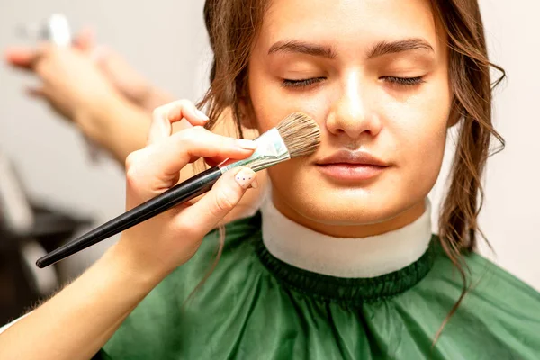 Makeup Artist Applies Cosmetic Tonal Foundation Face Using Makeup Brush — Stockfoto