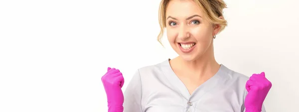 Happy Caucasian Woman Doctor Wearing Pink Gloves Celebrates Raising Fists — 图库照片