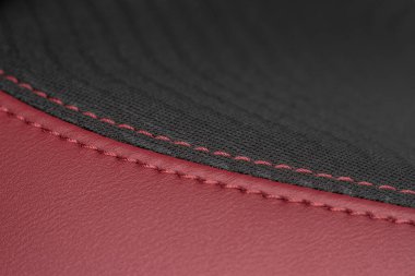 Modern araba kumaş koltuklarının yüksek açılı görüntüsü. Araba koltuğu desenini ve iç dekorasyonunu kapat. Bir arabanın ayrıntılı görüntüsü dikiş işini tamamlar.