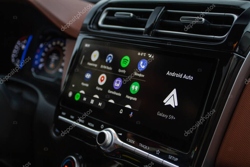 MOSCOW, RUSSIA - SEPTEMBER 15, 2021 Android Auto on the screen. Homescreen. Modern car. Interior close up. Car media close up view. Homescreen.