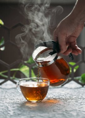 Kokulu çay ve çaydanlık, çay seremonisi konsepti.