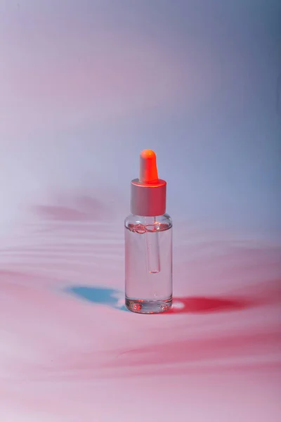 Perfume Bottle Red Liquid Blue Background — Stock Photo, Image