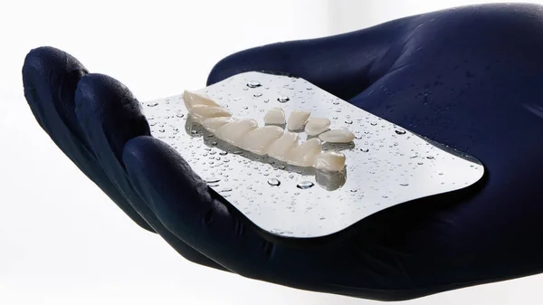 Ceramic Dental Crowns Hand Doctor Glass — Stock Photo, Image