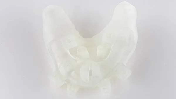 Összecsukható Fogászati Sablon Páciens Fogainak Támogatásával Implantációhoz Felülnézet Fehér Alapon — Stock Fotó