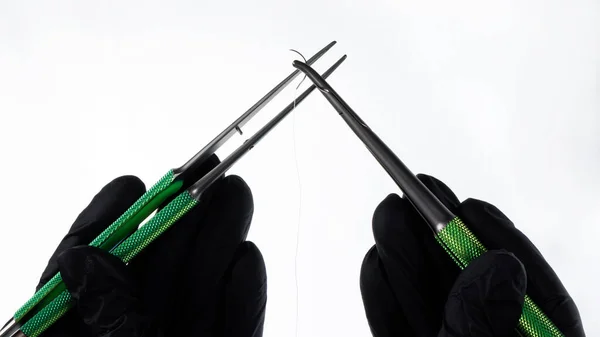 Dental Needle Holder Needle Thread Tweezers Black Gloves White Background — Stockfoto