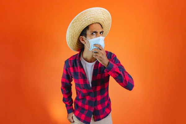Black Man Junina Party Outfit Pandemic Mask Isolated Orange Background — Stock fotografie
