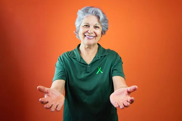 World Mental Health Day Mature Woman Gray Hair Green Ribbon — ストック写真