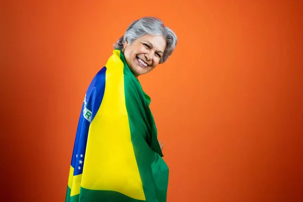 Mature Woman Gray Hare Holding Brazil Flag — Stock fotografie