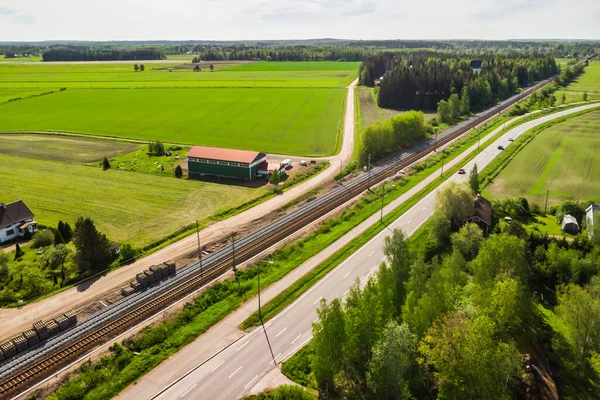 Aerial panoramic view of road and railway in place Myllykoski in Kouvola, Finland.