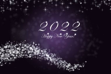 Mutlu yıllar 2022. Yıl 2022, parlak yanan sayılar. Yıldızlar ve mavi arka planda bokeh..