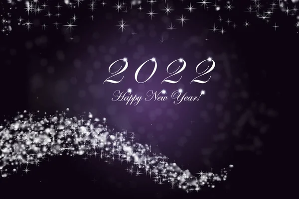 Mutlu yıllar 2022. Yıl 2022, parlak yanan sayılar. Yıldızlar ve mavi arka planda bokeh..
