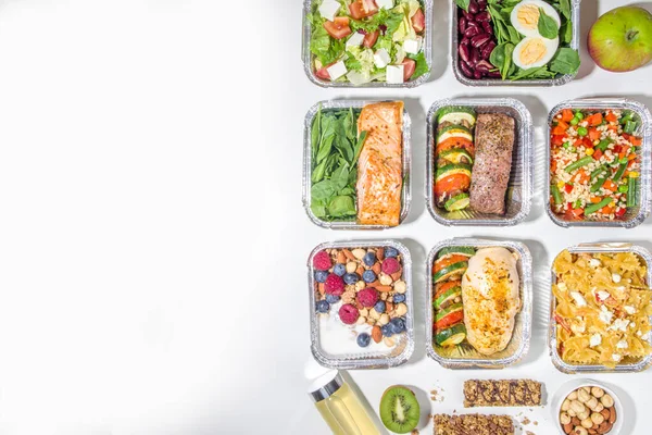 Healthy catering menu, courier food delivery lunch boxes. Beef steak meat, chicken filet , fish and vegetables in packages. Daily meal diet plan delivery , take away containers, online order concept