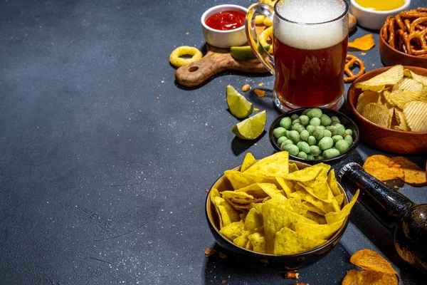 Beer Various Salted Snacks Set Black Table Background Traditional Party — Foto Stock