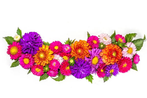 Autumn flowers flatlay background. Bouquet of colorful chrysanthemum, peonies  (orange, purple, yellow, red) flowers on white background, frame border for greeting card top view copy space for text