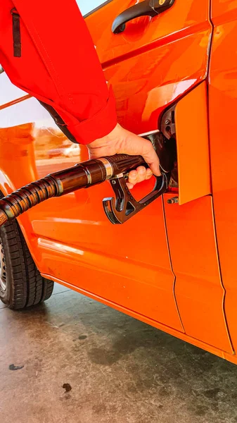 Man Hand Filling Tank His Vehicle Gas Station Hose — стоковое фото